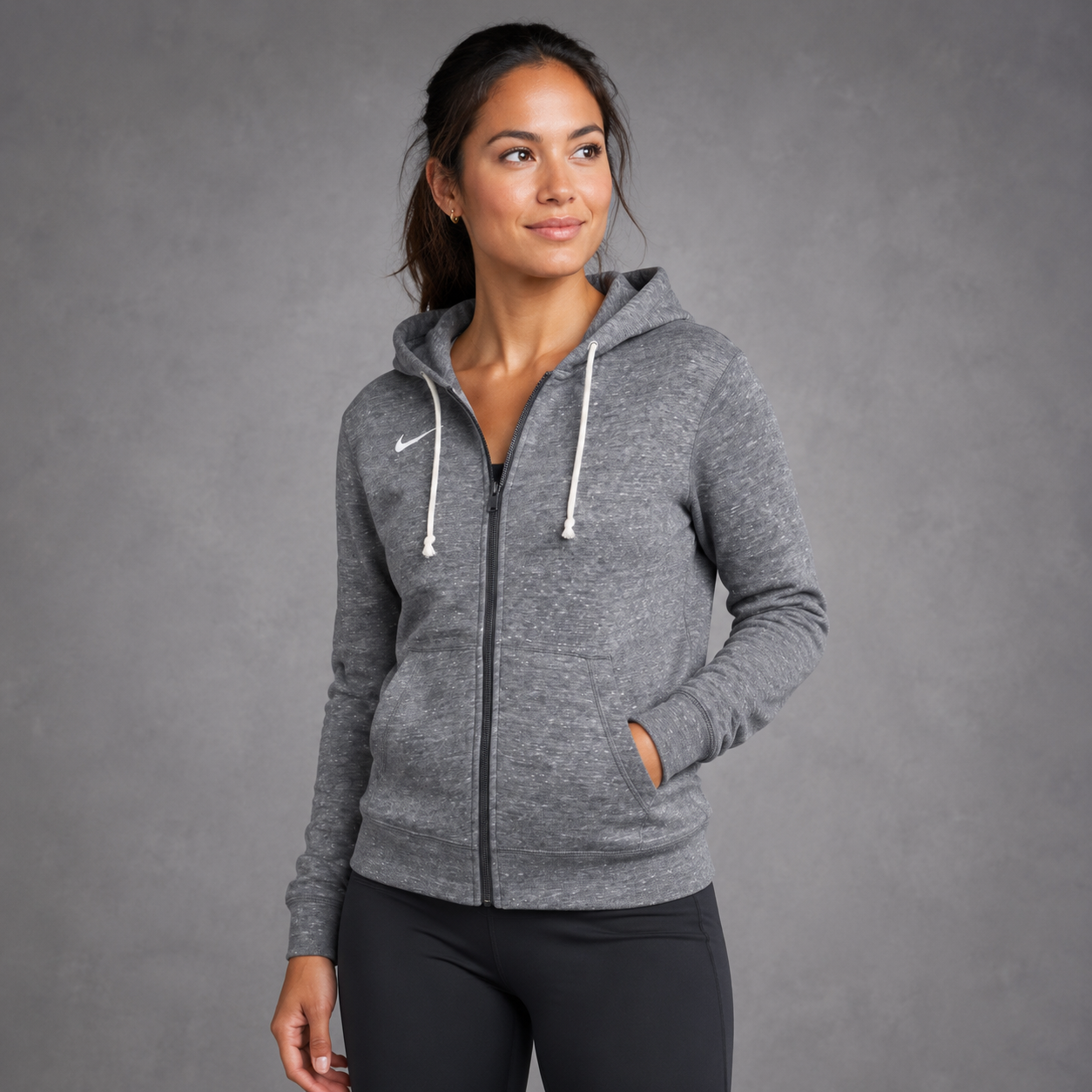 Female athlete modeling the gray Nike Women's Gym Vintage Full-Zip Hoodie